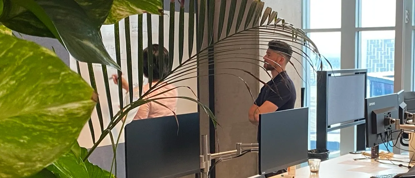 Daniel Morris working in the office